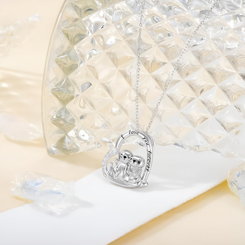 Cute animal pendant necklace featuring two playful animals in a heart design by Origsoul
