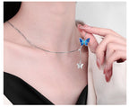 Origsoul delicate butterfly pendant jewelry with blue and silver butterfly charms on silver chain