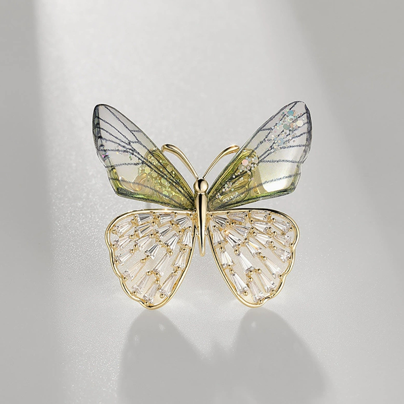 Elegant nature-inspired brooch featuring a detailed butterfly design with shimmering wings