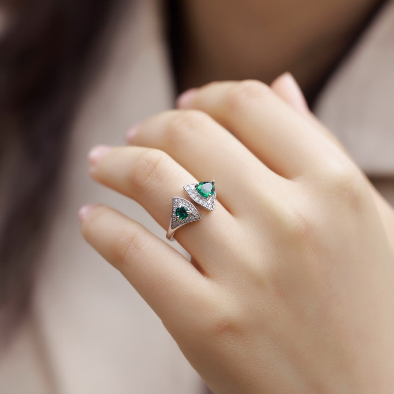 Origsoul emerald cut wedding ring with twin triangular green gemstones on silver band