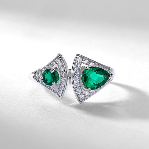 Origsoul emerald cut wedding ring with vibrant green gemstone and diamond accents in silver setting