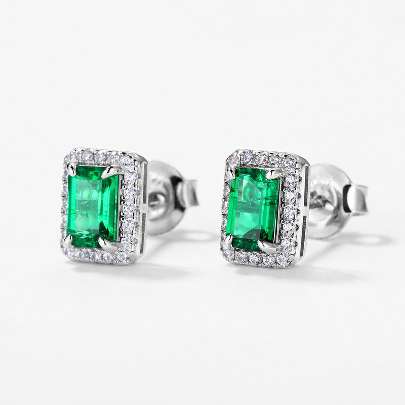 Origsoul emerald green ear stud earrings with rectangular stones surrounded by small clear crystals
