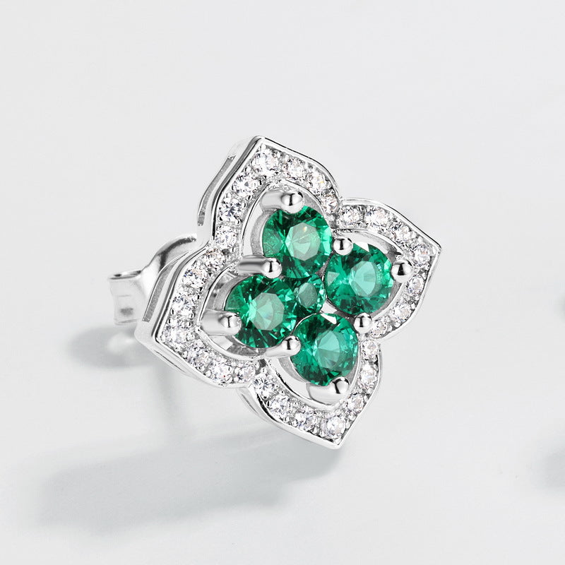 Origsoul silver stud emerald earrings earrings with four green gemstones and surrounding clear crystals