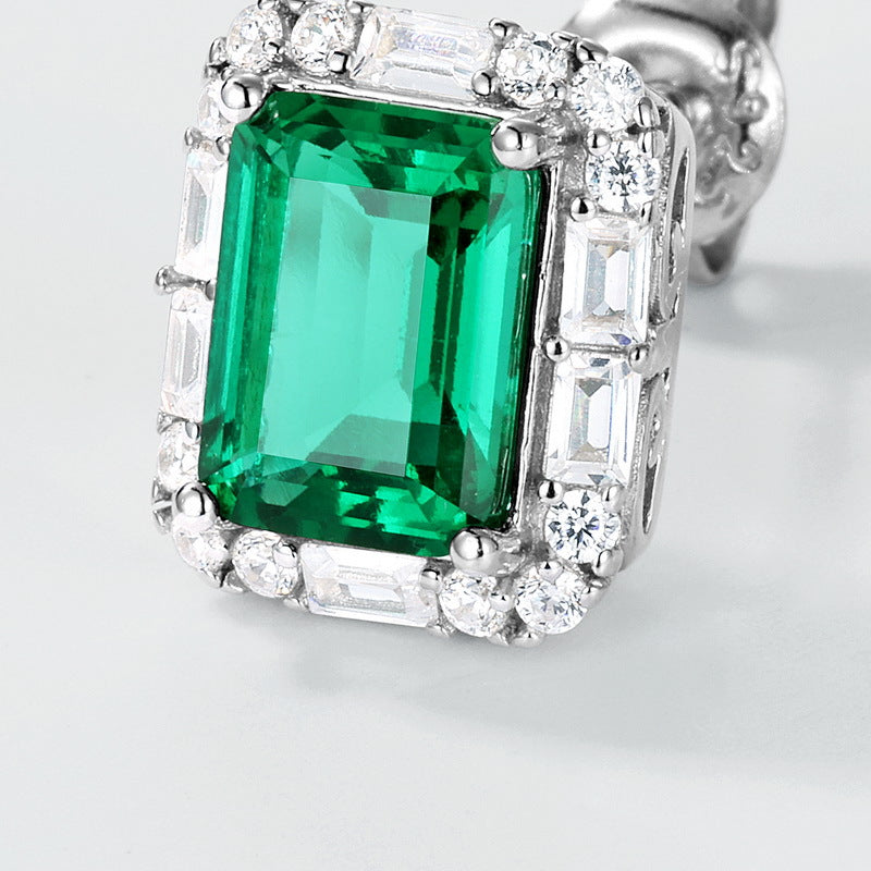 Origsoul emerald earrings stud with rectangular green emerald center and surrounding white gemstones