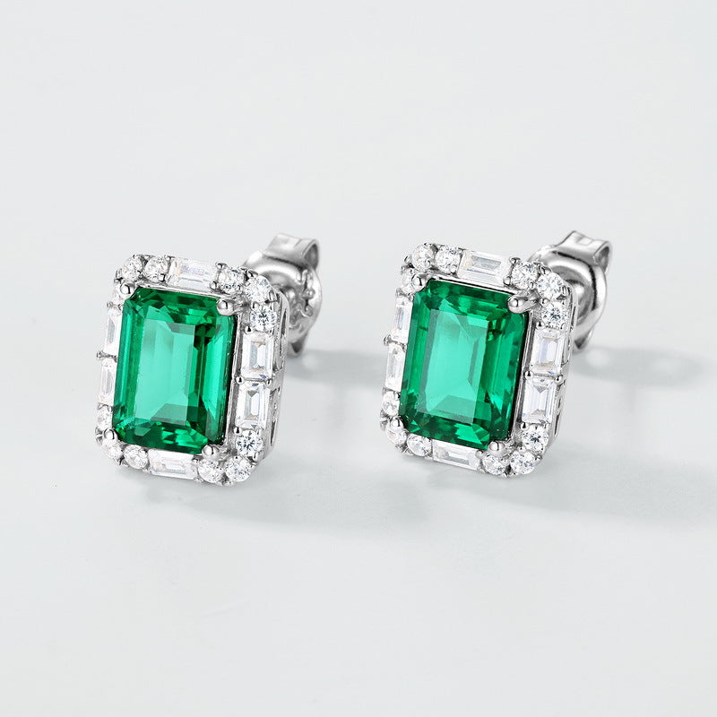 Origsoul emerald earrings stud with rectangular green stones surrounded by clear crystals in silver setting