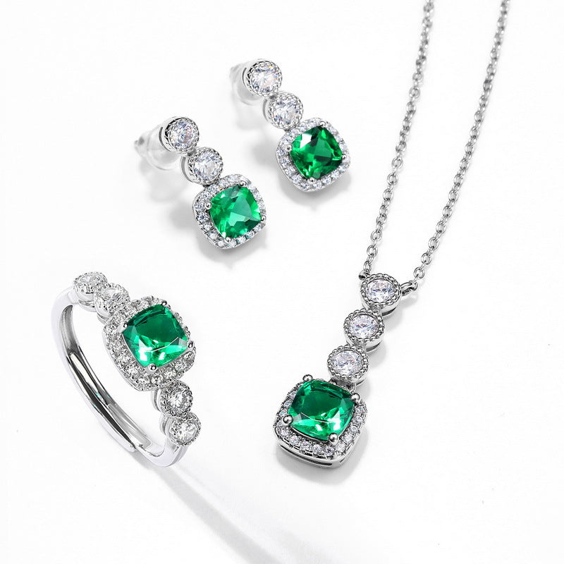 Origsoul jewelry set featuring necklace emerald with matching ring and earrings in silver with green stones