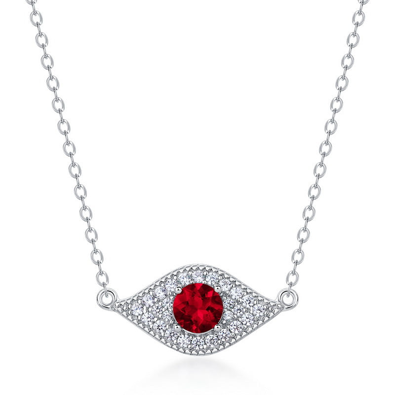Origsoul silver necklace with red gemstone surrounded by clear crystals resembling emerald necklace style