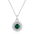 Origsoul emerald necklace with round green gemstone surrounded by clear crystals on silver chain