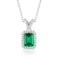 Origsoul emerald necklace with rectangular green gemstone surrounded by small clear crystals on silver chain
