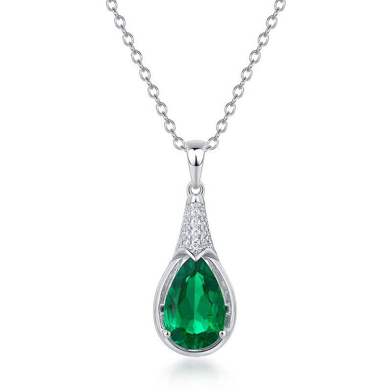 Origsoul silver emerald necklace with teardrop-shaped green gemstone and small accent diamonds