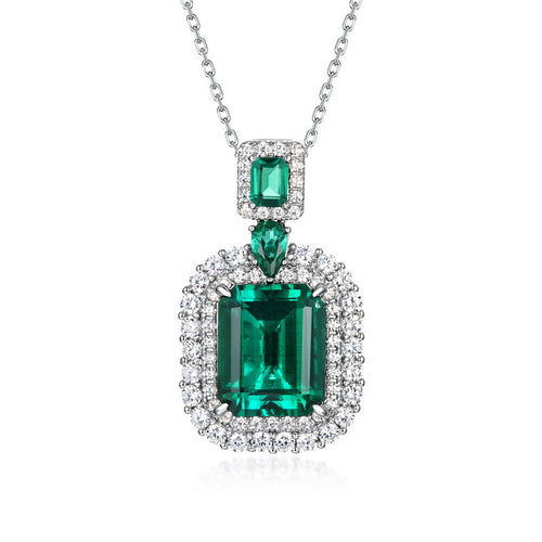 Origsoul emerald necklace with large rectangular emerald and diamond halo pendant on silver chain