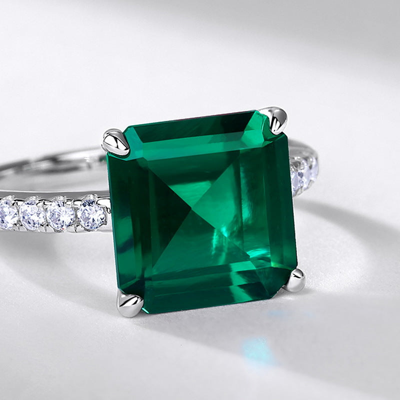 Origsoul engagement ring emerald cut with large green gemstone and diamond accents on silver band