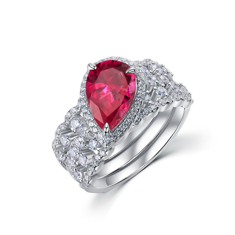 Origsoul pear-shaped ruby ring surrounded by diamonds with engagement ring emerald cut style accents
