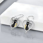 Origsoul family cat earrings with silver heart frames and three cats in black gold and silver tones