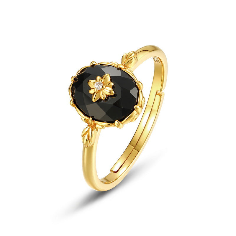 Origsoul gold plated silver sterling ring with black gemstone and floral design centerpiece