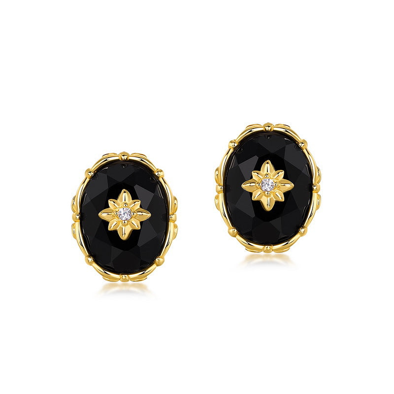 Origsoul silver sterling ring with black oval stone and gold floral design with diamond center