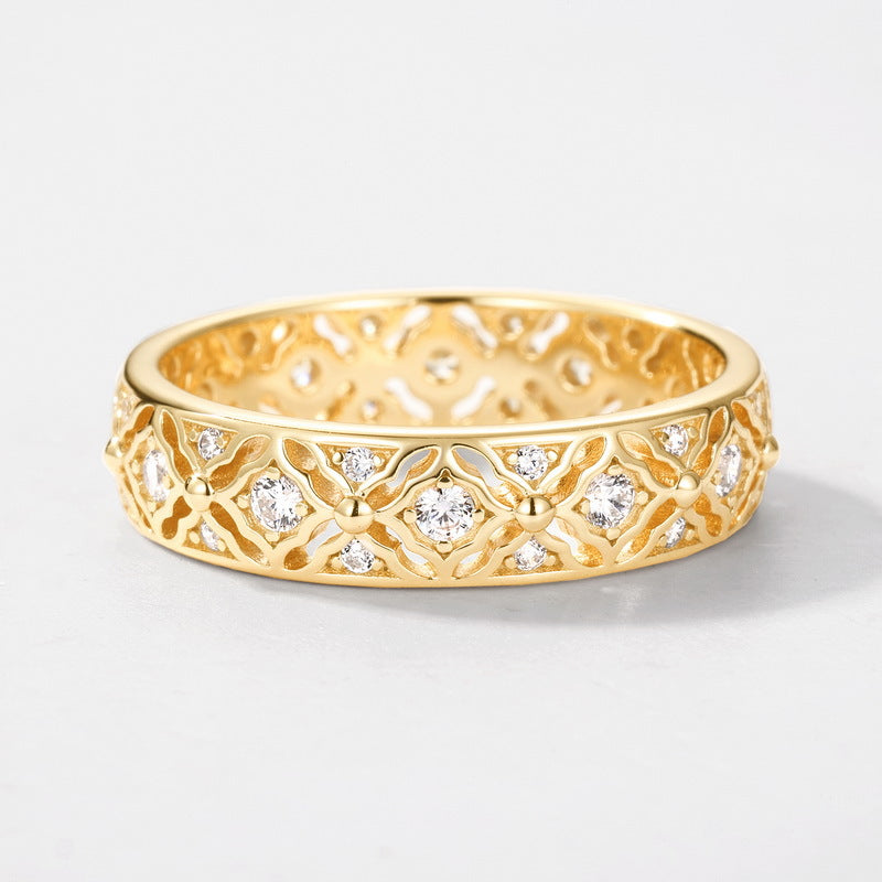 Origsoul gold ring of engagement with intricate design and embedded diamonds