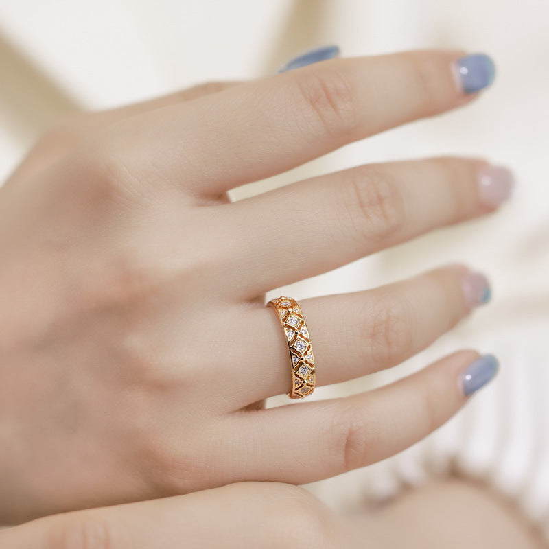 Origsoul gold ring of engagement with intricate diamond pattern worn on finger