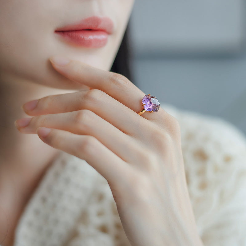 Origsoul ring sterling silver with purple gemstone worn on hand close-up