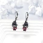 Origsoul gothic black rose earrings with intricate detailing and red gemstone accents