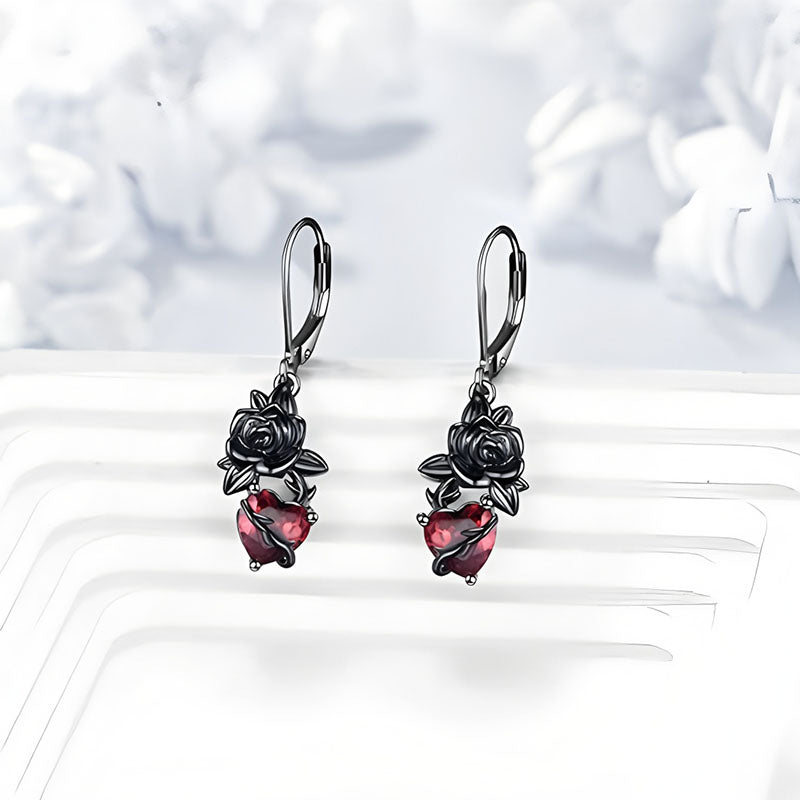 Origsoul gothic black rose earrings with intricate detailing and red gemstone accents