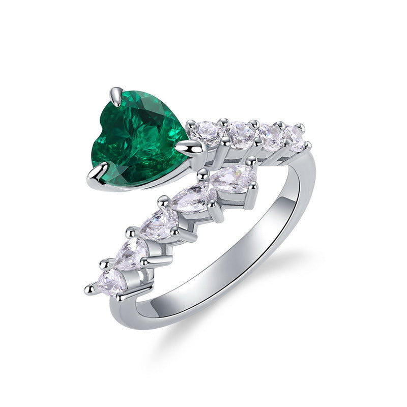 Origsoul heart-shaped emerald cut-engagement ring with silver band and clear accent stones