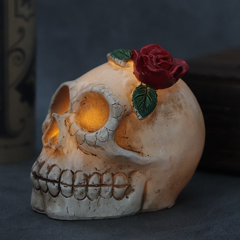 Origsoul Halloween skull light decor with glowing eyes and red rose on top for spooky home decoration
