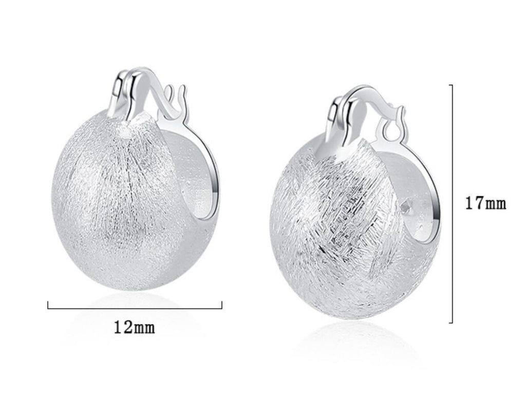 Origsoul hand-drawn silver earrings with textured surface and secure clasp measuring 12mm by 17mm