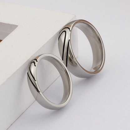 Origsoul silver heart shaped couple rings set with smooth polished finish on white background