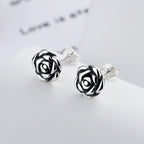 Origsoul June birth flower earrings in silver with intricate rose design stud style