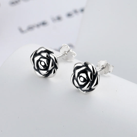 Origsoul June birth flower earrings in silver with intricate rose design stud style