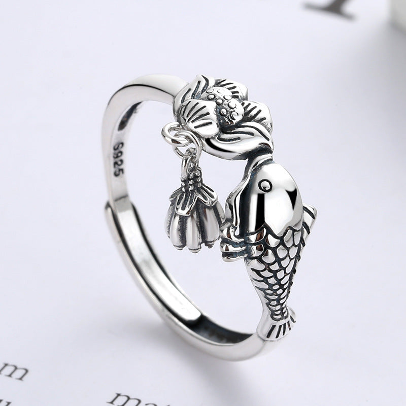 Origsoul sterling silver lotus fish ring with detailed fish and lotus flower design