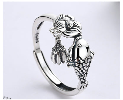 Origsoul sterling silver lotus fish ring featuring detailed fish and lotus flower design
