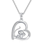 Origsoul heart shaped necklace featuring a 925 sterling silver monkey pendant with cubic zirconia accents