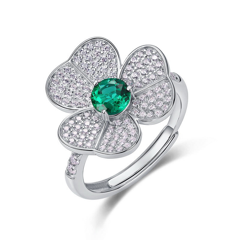 Origsoul floral ring with emerald cut-engagement ring centerpiece and sparkling diamond petals