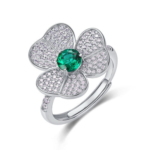 Origsoul floral ring with emerald cut-engagement ring centerpiece and sparkling diamond petals