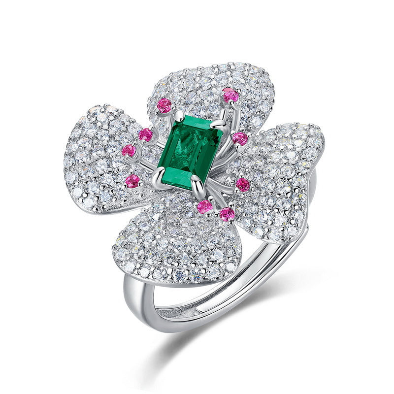 Origsoul emerald cut-engagement ring with green emerald center and diamond flower design