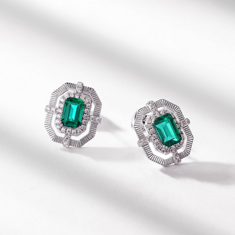 Origsoul hypoallergenic stud earrings with emerald green gemstones and silver decorative settings