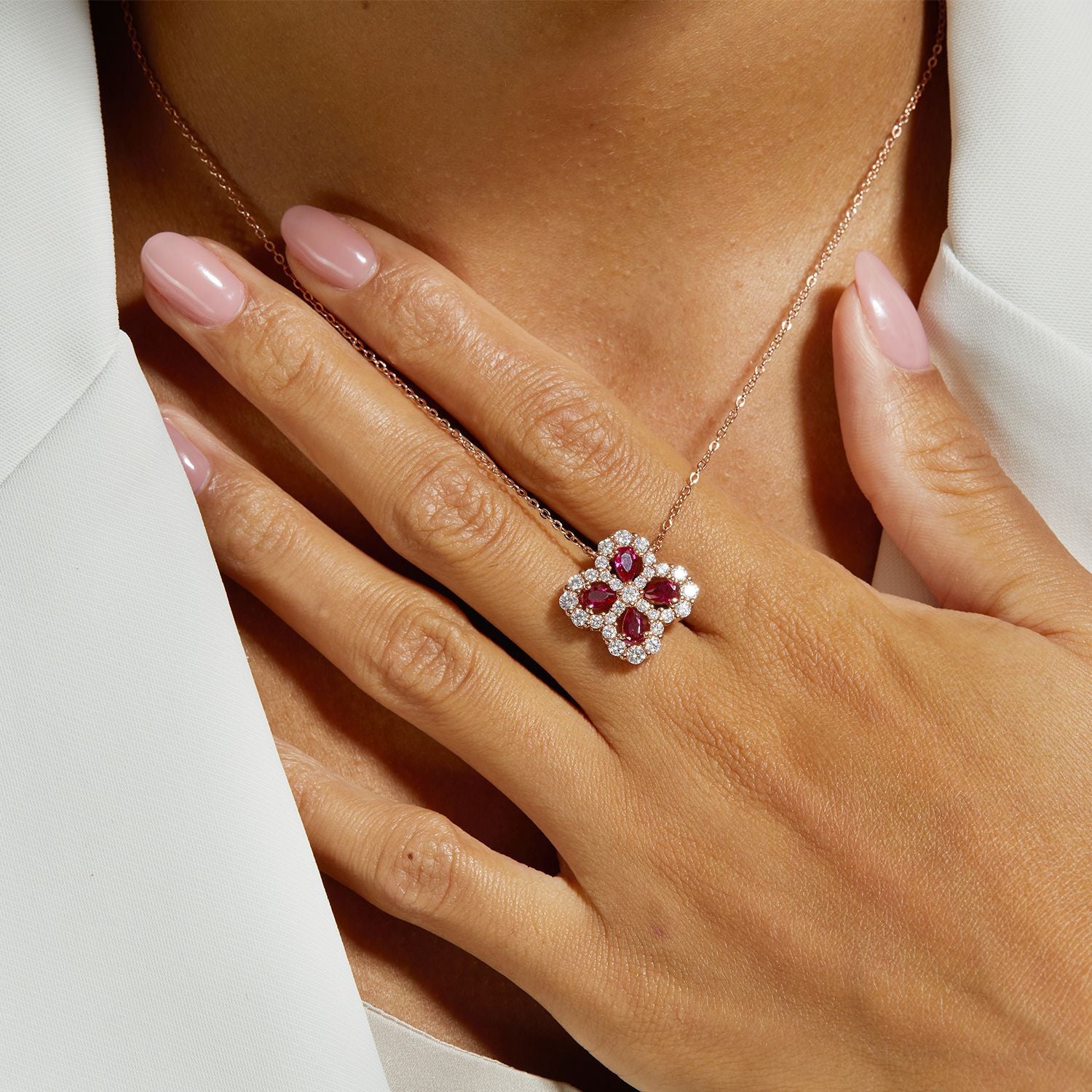 Origsoul elegant ruby necklace with floral pendant and sparkling gemstones on a woman’s neck