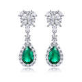 Origsoul sterling silver earrings with green teardrop gemstones and clear crystal floral tops