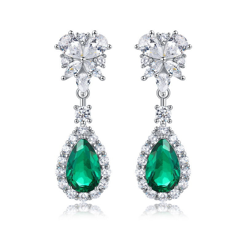 Origsoul sterling silver earrings with green teardrop gemstones and clear crystal floral tops