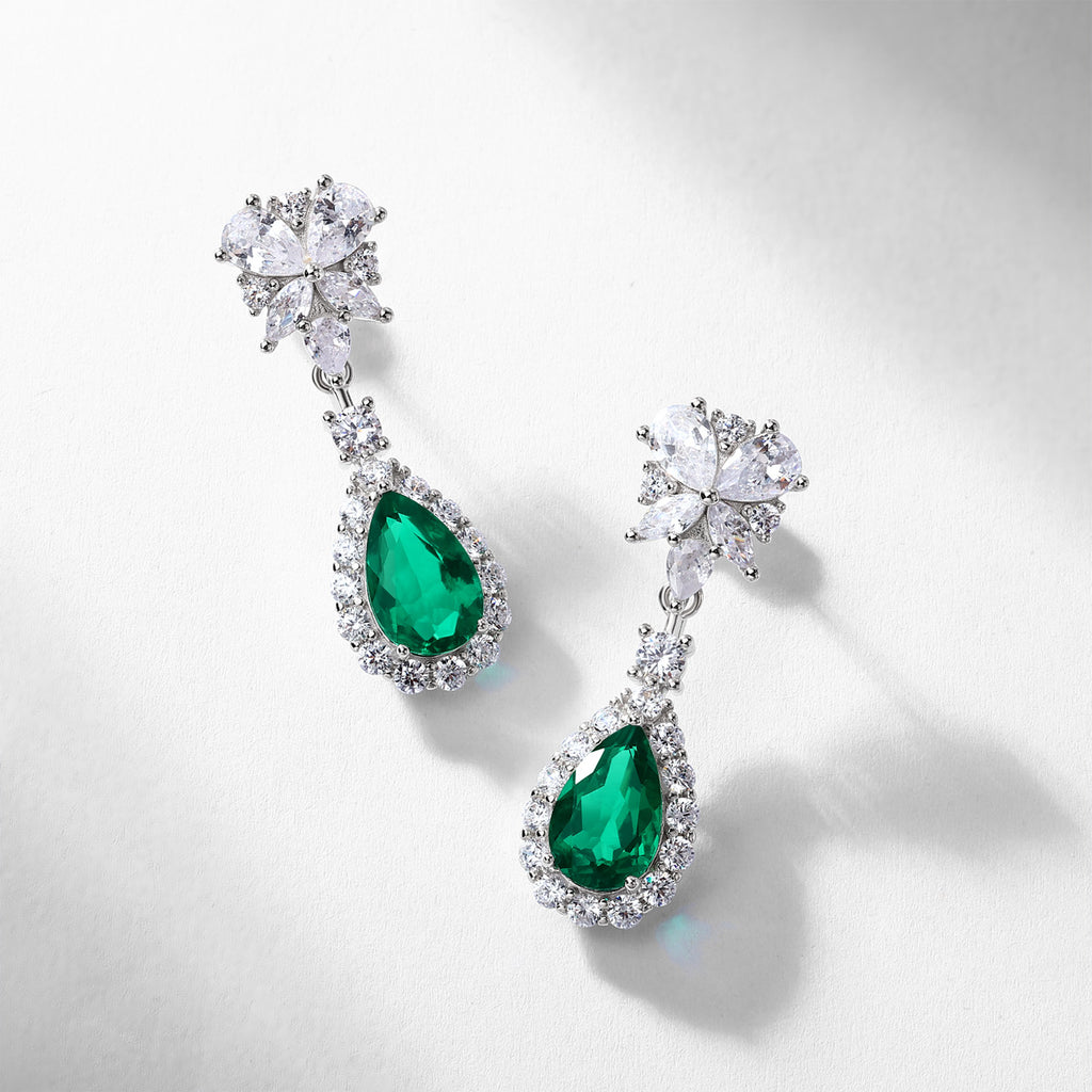 Origsoul sterling silver earrings with teardrop green gemstones and clear crystal accents
