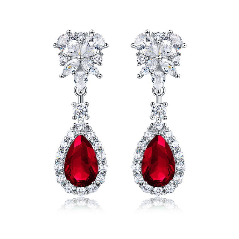 Origsoul sterling silver earrings with red teardrop gemstones and clear floral crystal accents
