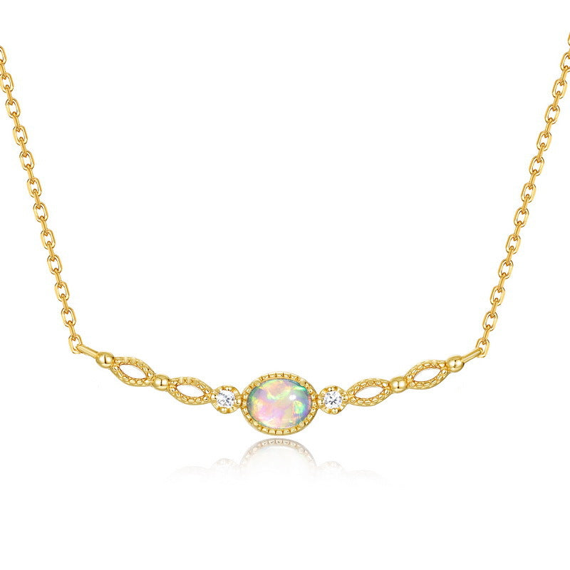 Origsoul gold chain necklace with opal centerpiece and sparkling accent stones jewelry