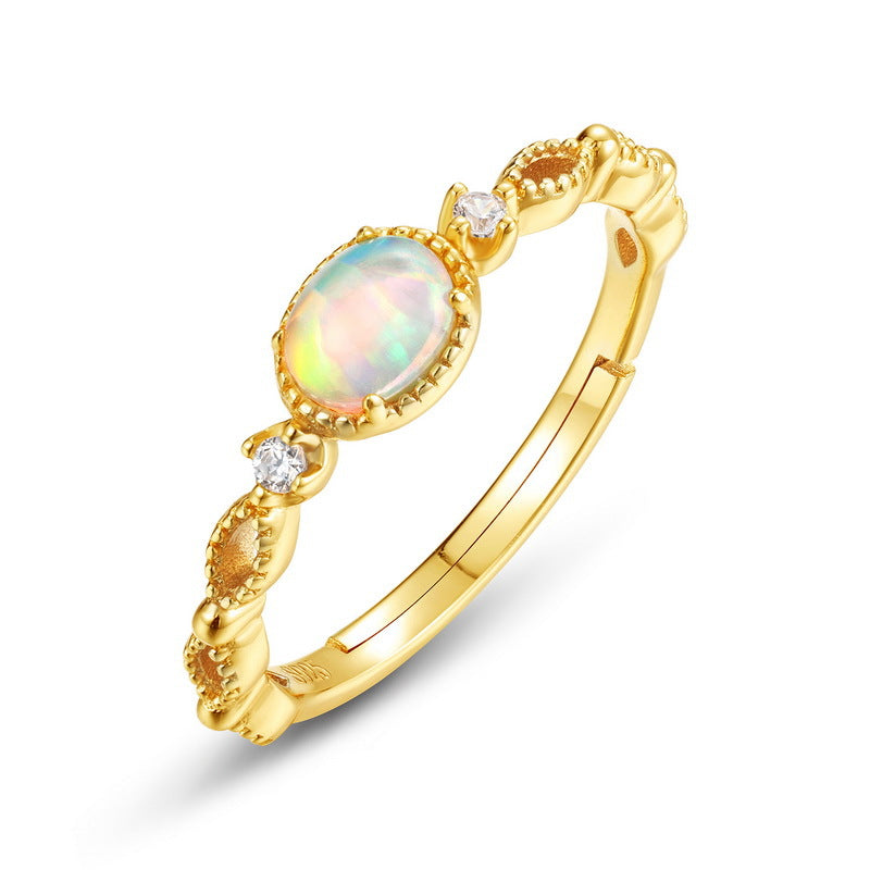 Origsoul sterling silver hoop earrings with gold plating and opal gemstone detailing