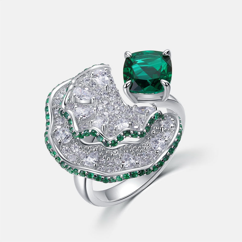 Origsoul sterling silver ring jewellery with intricate design featuring green and clear gemstones