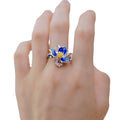 Origsoul March birth flower ring featuring a blue and silver flower design on hand
