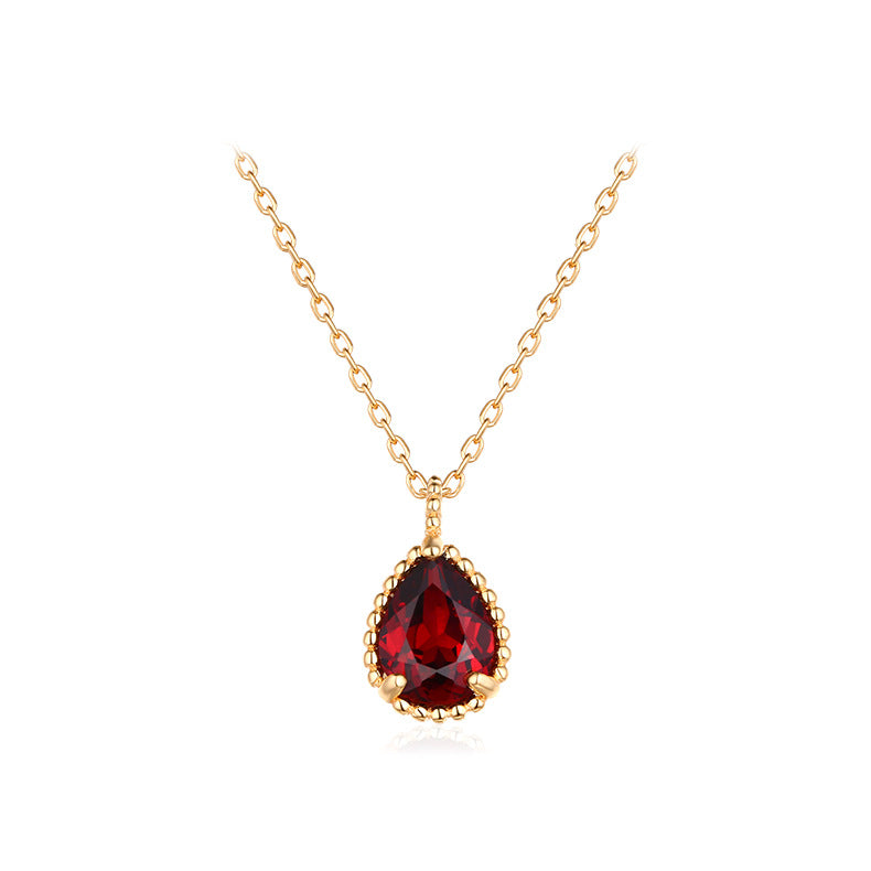 Origsoul men's silver cross pendant with a red gemstone on a gold chain necklace