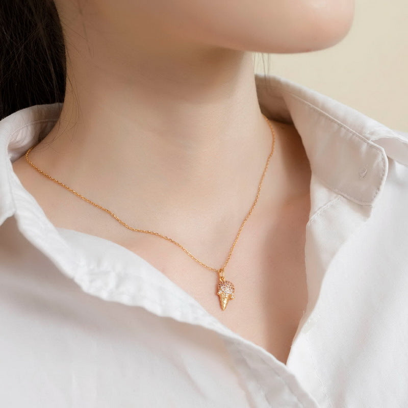 Origsoul gold necklace with ice cream pendant showcasing sterling silver jewlry elegance on a woman