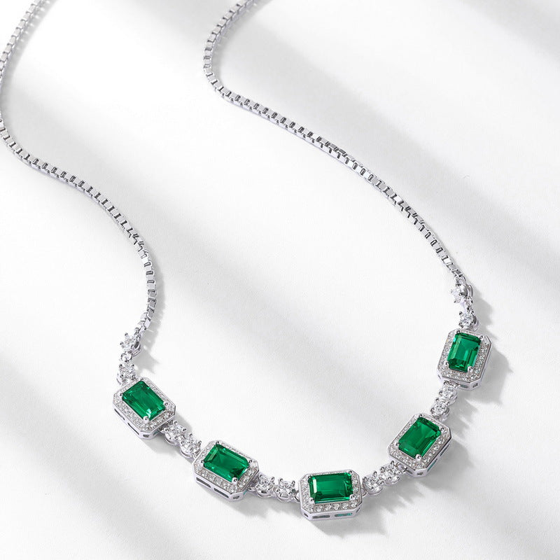 Origsoul necklace with choker featuring silver chain and green rectangular gemstones with clear crystals